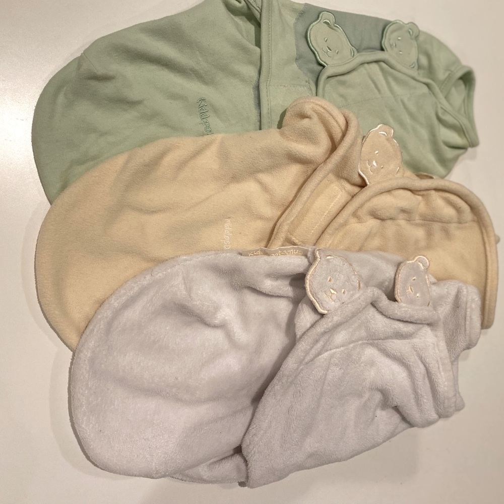 3 kiddopatomus swaddle wraps.